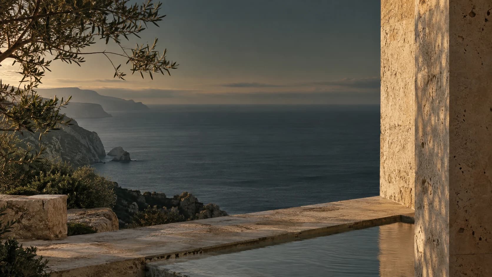 Warm coastal stone, olive branches and a quiet sea